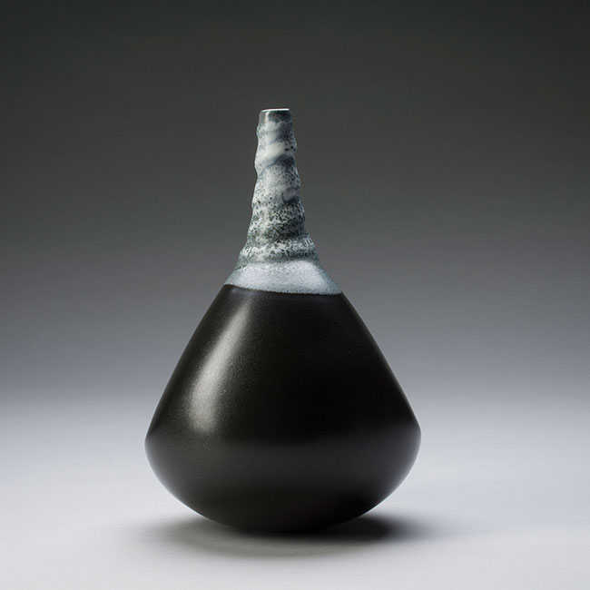 hand-thrown porcelain vessel with black and white semi-mat glaze